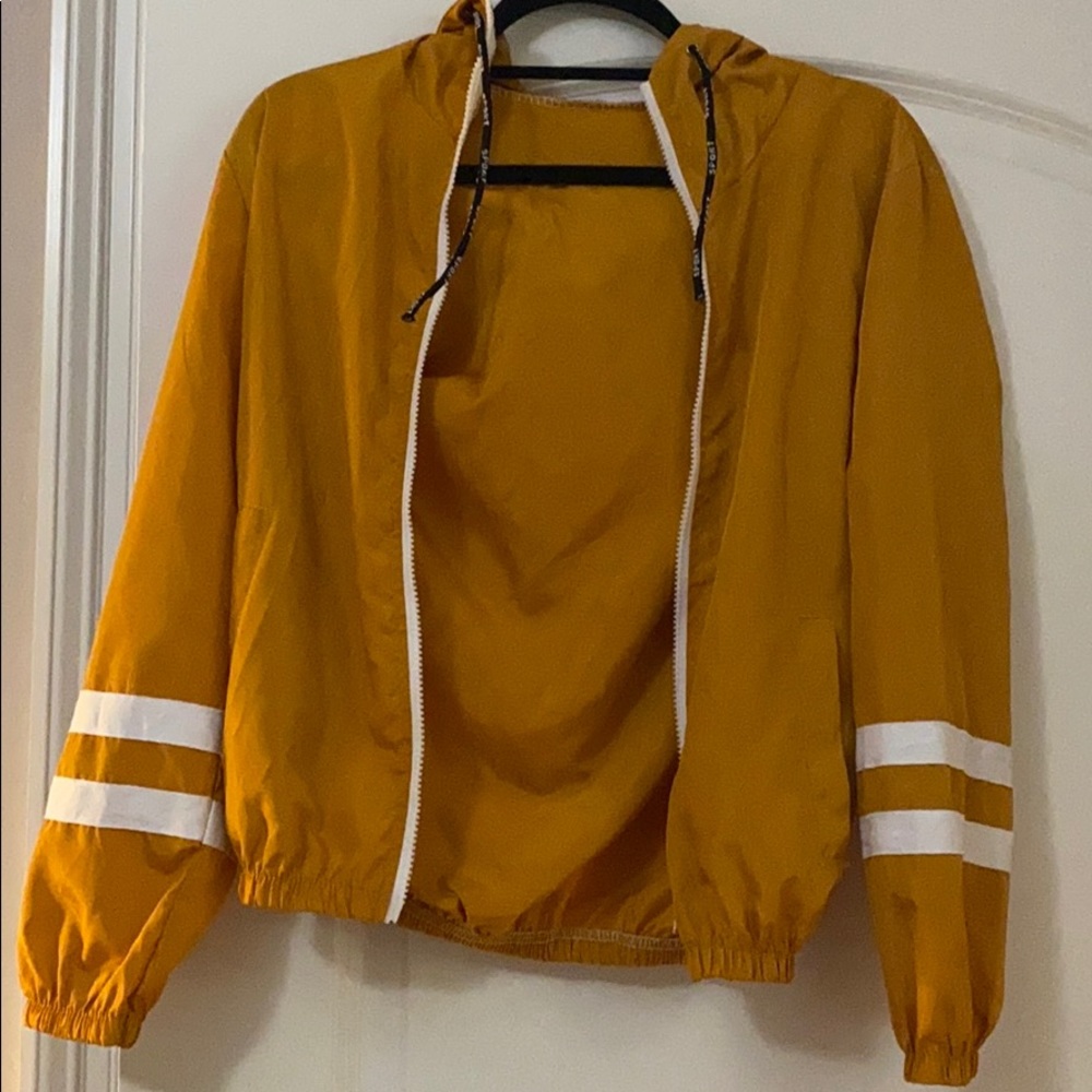 Yellow/orange windbreaker